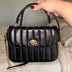 Coach crossbody with top handle. Black with gold hardware. Excellent condition!